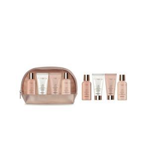Kit doccia schiuma 100 ml , gel doccia scintillante 100 ml , crema corpo 60 ml , scur corpo e pochette